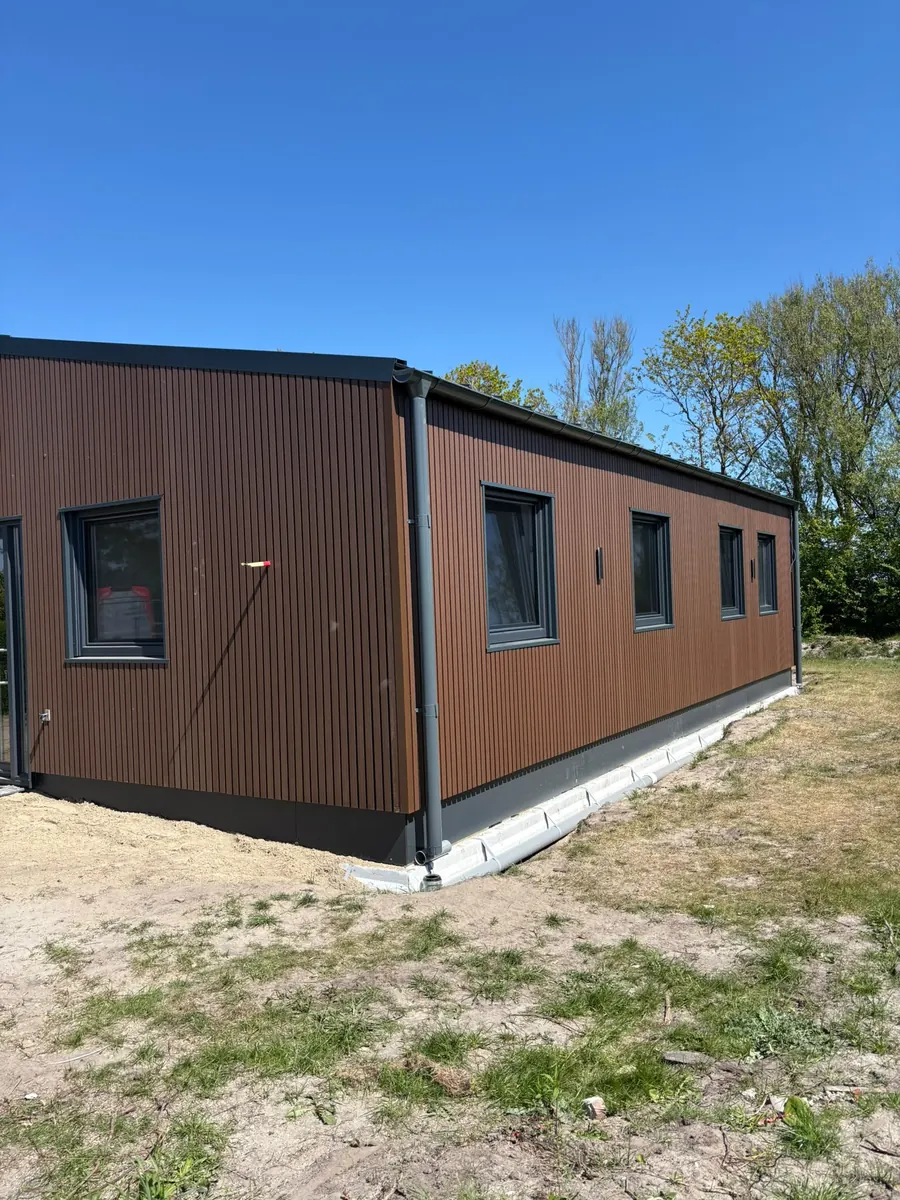 Houten gevelbekleding op nieuwbouw